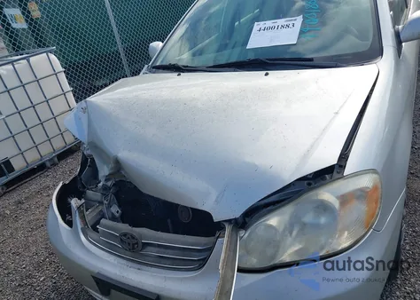 2003 Toyota Corolla Le z USA, uszkodzony, nr VIN JTDBR32E232014838